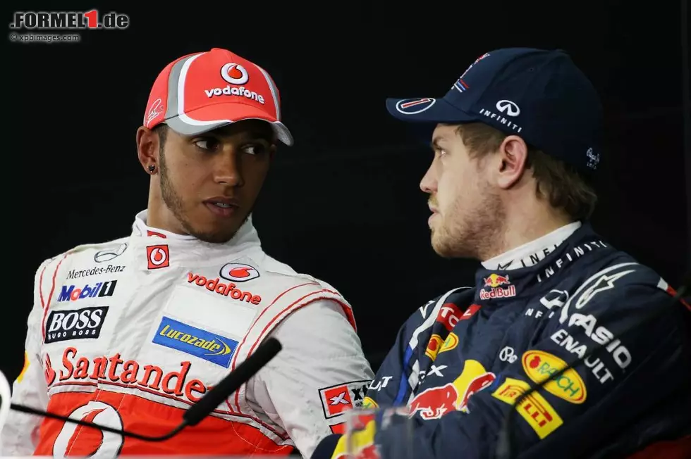 Foto zur News: Lewis Hamilton (McLaren) und  Sebastian Vettel (Red Bull)