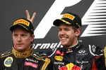 Foto zur News: Kimi Räikkönen (Lotus) und Sebastian Vettel (Red Bull)