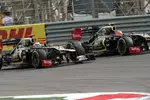 Foto zur News: Kimi Räikkönen (Lotus) und Romain Grosjean (Lotus)