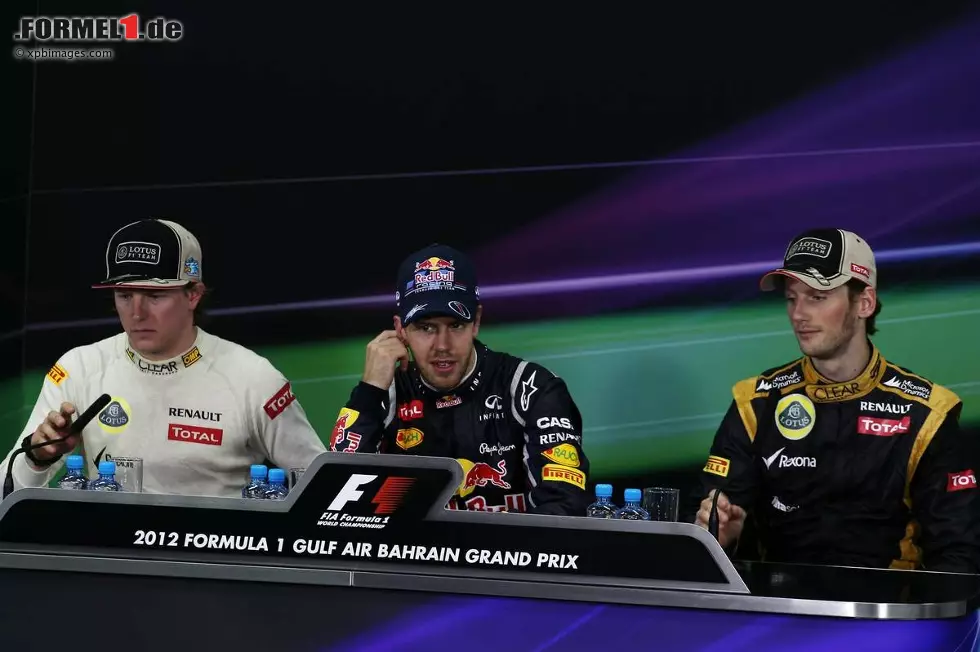 Foto zur News: Sebastian Vettel (Red Bull), Romain Grosjean und (Lotus) Kimi Räikkönen (Lotus)