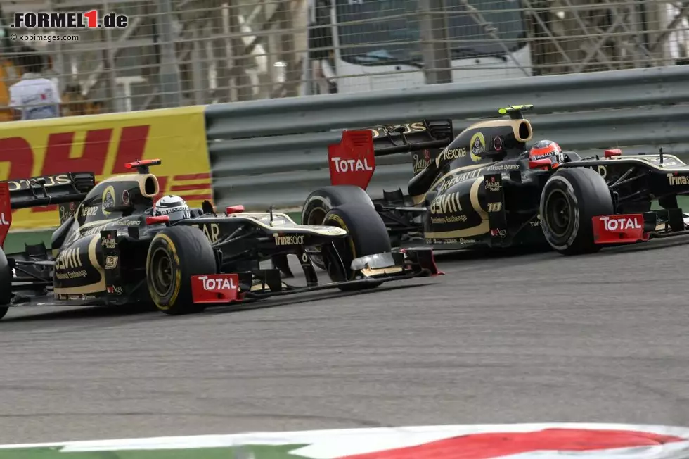 Foto zur News: Kimi Räikkönen (Lotus) und Romain Grosjean (Lotus)