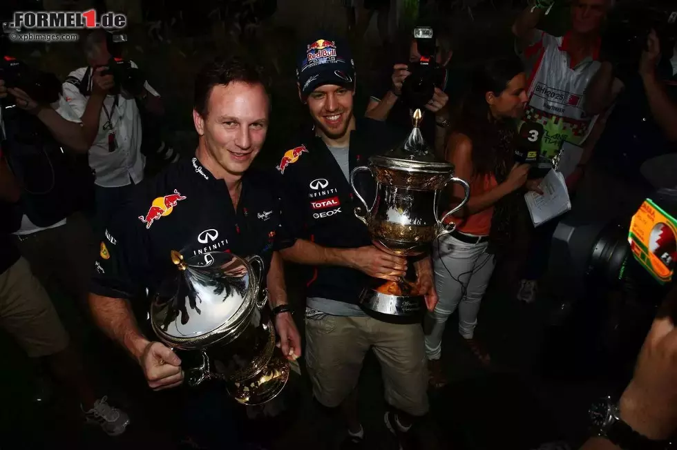 Foto zur News: Christian Horner (Teamchef) und Sebastian Vettel (Red Bull)