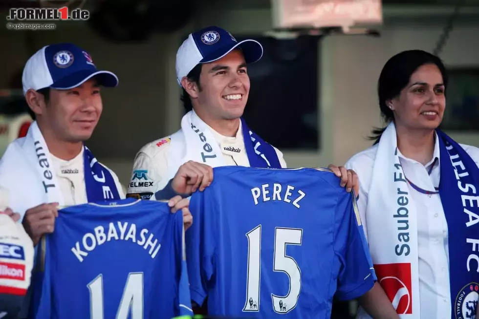 Foto zur News: Kamui Kobayashi (Sauber) Sergio Perez (Sauber)