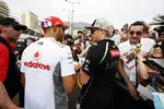 Foto zur News: Lewis Hamilton (McLaren) und Kimi Räikkönen (Lotus)