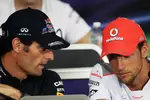 Foto zur News: Mark Webber (Red Bull) und Jenson Button (McLaren)