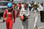 Foto zur News: Fernando Alonso (Ferrari), Michael Schumacher (Mercedes) und Nico Rosberg (Mercedes)