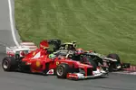 Foto zur News: Felipe Massa (Ferrari) und Romain Grosjean (Lotus)