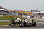 Foto zur News: Kamui Kobayashi (Sauber) und Sergio Perez (Sauber)