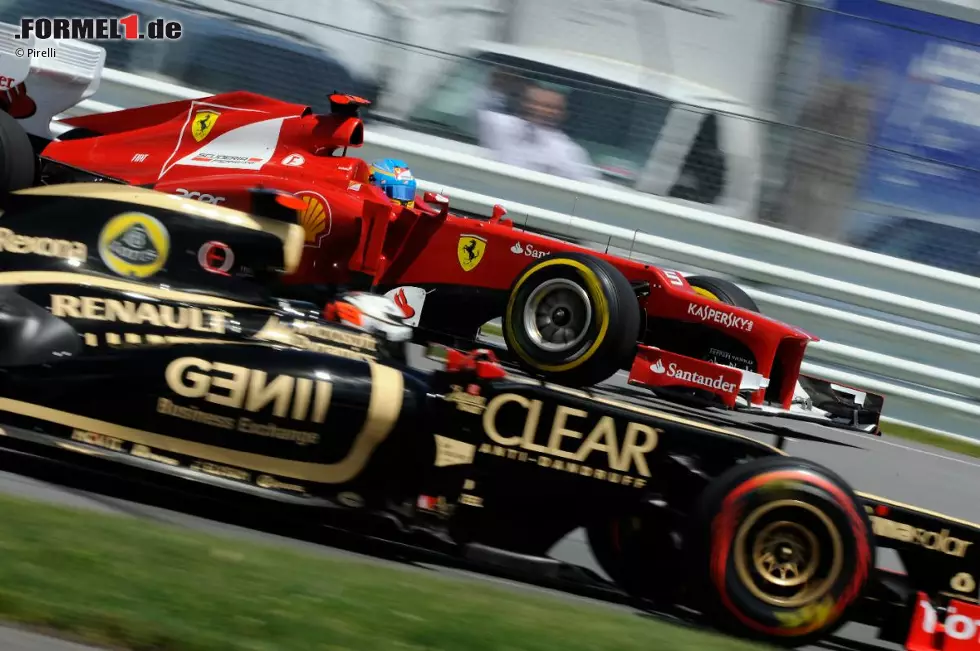 Foto zur News: Fernando Alonso (Ferrari) und Kimi R?ikk?nen (Lotus)