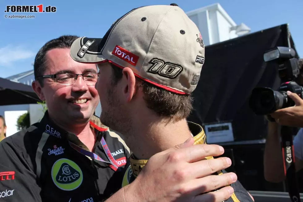 Foto zur News: Eric Boullier (Lotus-Teamchef) und Romain Grosjean (Lotus)