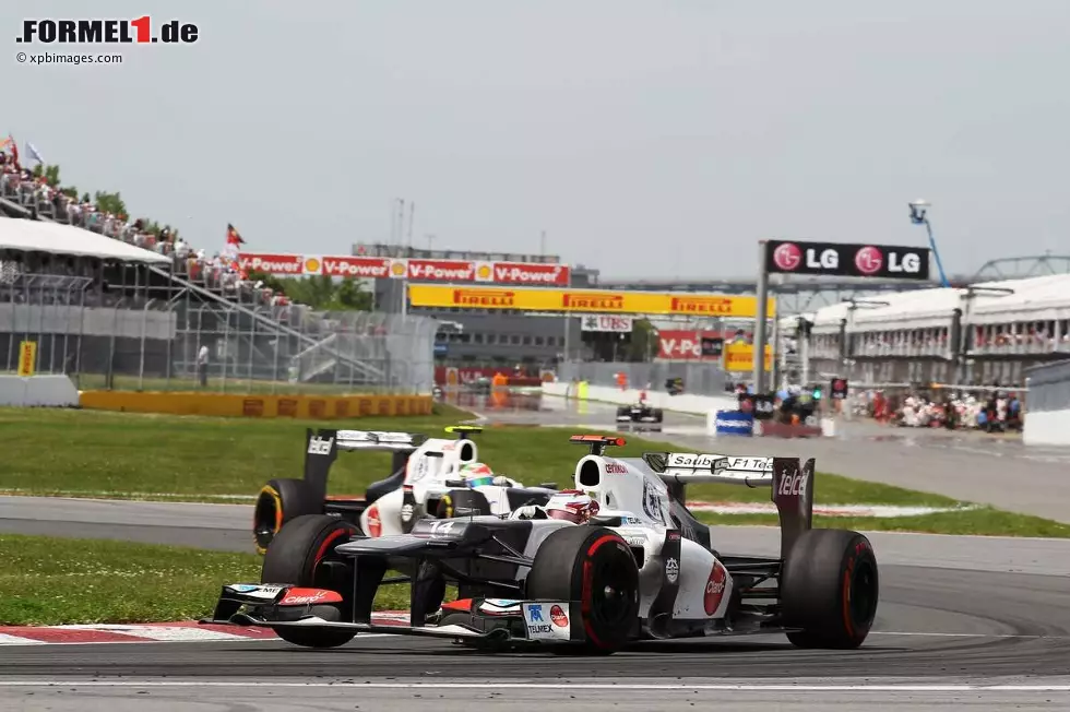 Foto zur News: Kamui Kobayashi (Sauber) und Sergio Perez (Sauber)