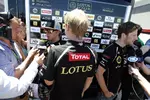 Foto zur News: Kimi Räikkönen (Lotus) und Romain Grosjean (Lotus)