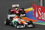 Foto zur News: Jules Bianchi (Force India) und Felipe Massa (Ferrari) im ersten Training am Freitag in Valencia.