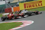 Foto zur News: Fernando Alonso (Ferrari) und Jenson Button (McLaren)