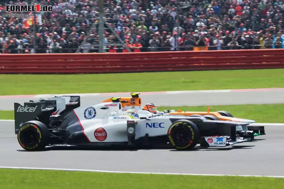 Foto zur News: Nico Hülkenberg (Force India) und Sergio Perez (Sauber)