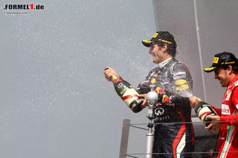 Foto zur News: Mark Webber (Red Bull) und Fernando Alonso (Ferrari)