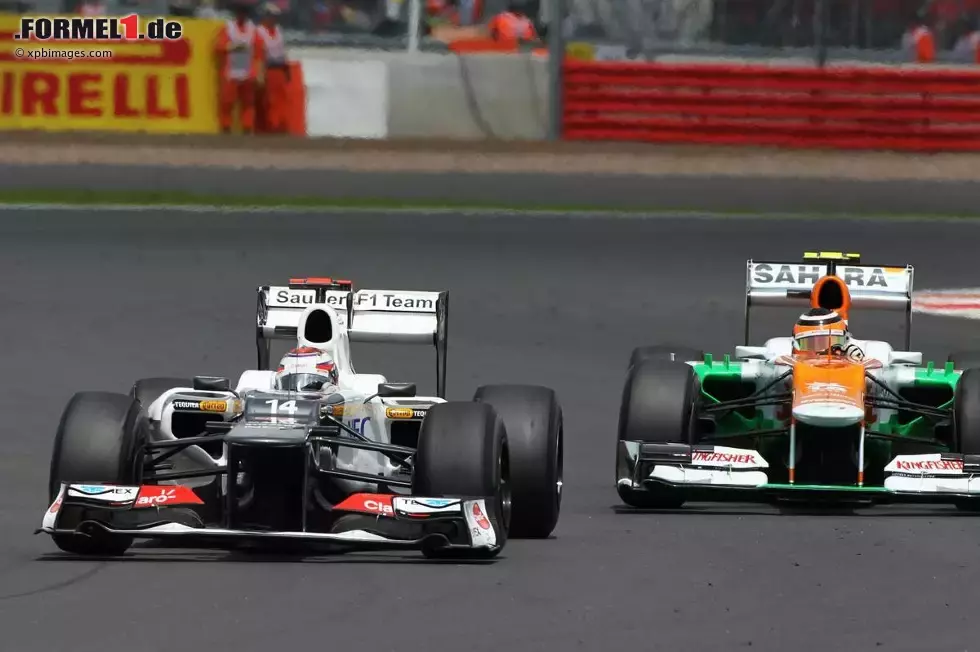 Foto zur News: Kamui Kobayashi (Sauber) und Nico Hülkenberg (Force India)