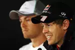 Foto zur News: Sebastian Vettel (Red Bull) und Nico Rosberg (Mercedes)