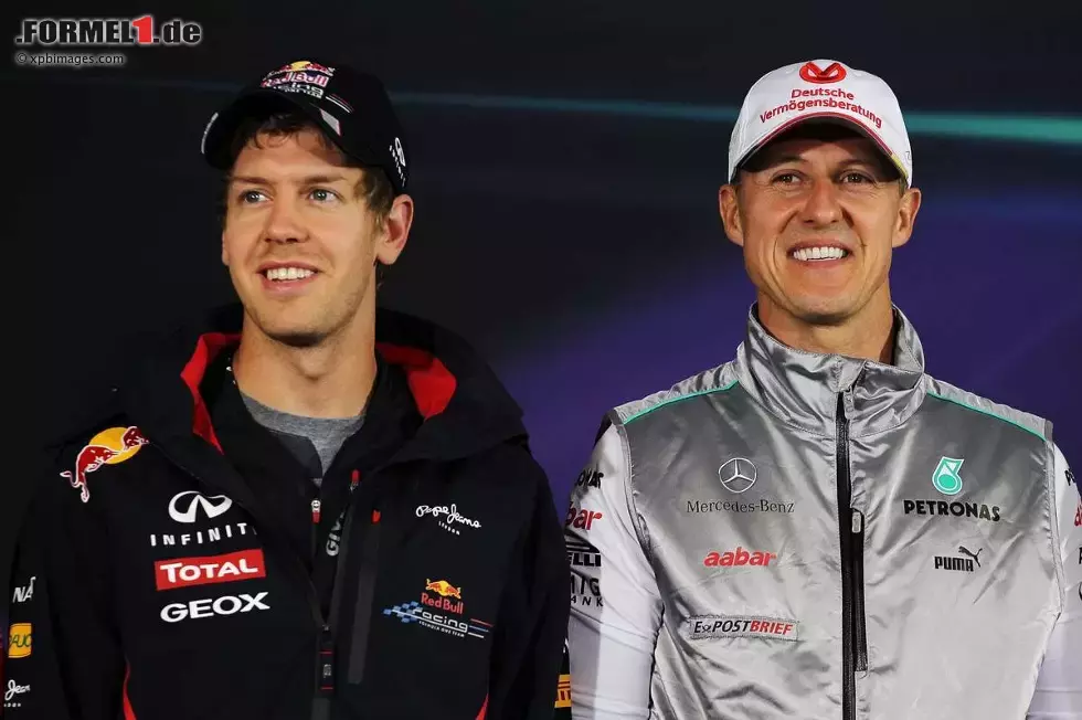 Foto zur News: Sebastian Vettel (Red Bull) und Michael Schumacher (Mercedes)