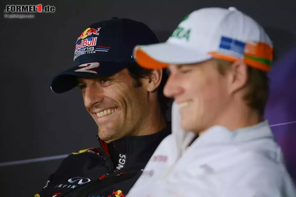 Foto zur News: Mark Webber (Red Bull) und Nico Hülkenberg (Force India)