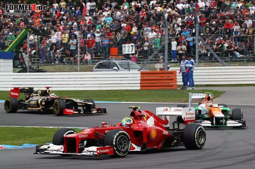 Foto zur News: Felipe Massa (Ferrari), Nico Hülkenberg (Force India) und Kimi Räikkönen (Lotus)