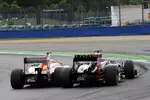 Foto zur News: Paul di Resta (Force India) und Kimi Räikkönen (Lotus)