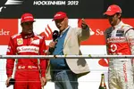 Foto zur News: Fernando Alonso (Ferrari) und Jenson Button (McLaren)