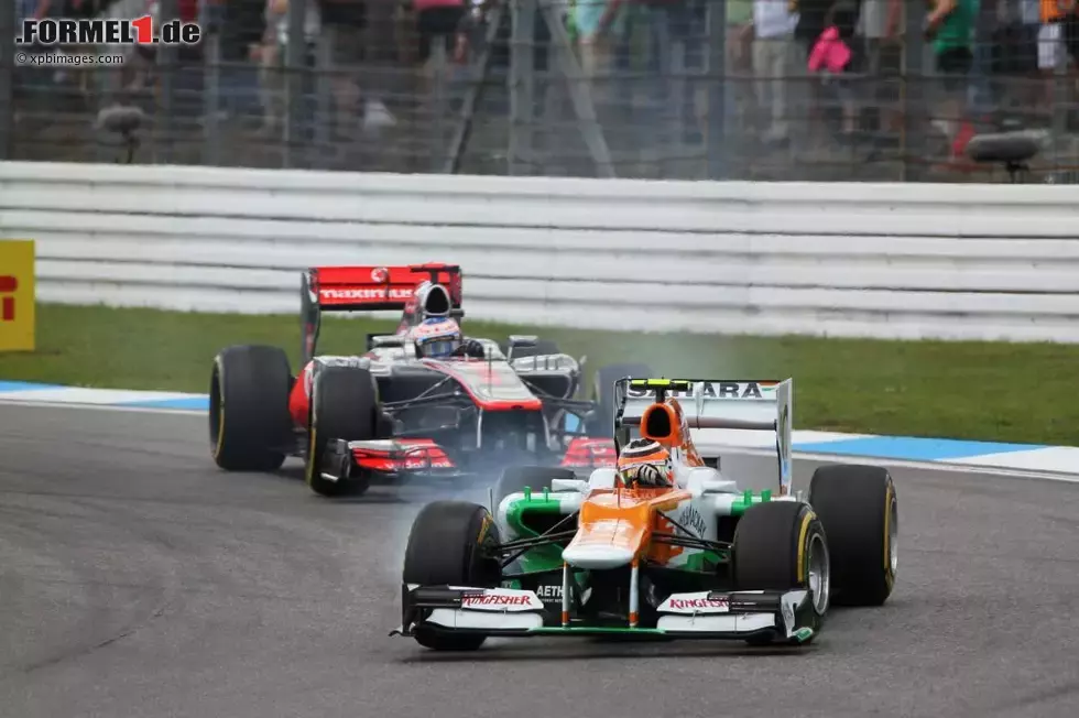 Foto zur News: Nico Hülkenberg (Force India) und Jenson Button (McLaren)