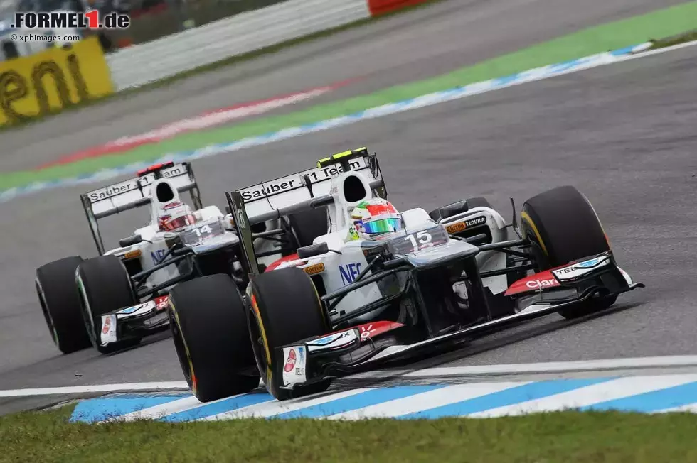 Foto zur News: Sergio Perez (Sauber) und Kamui Kobayashi (Sauber)