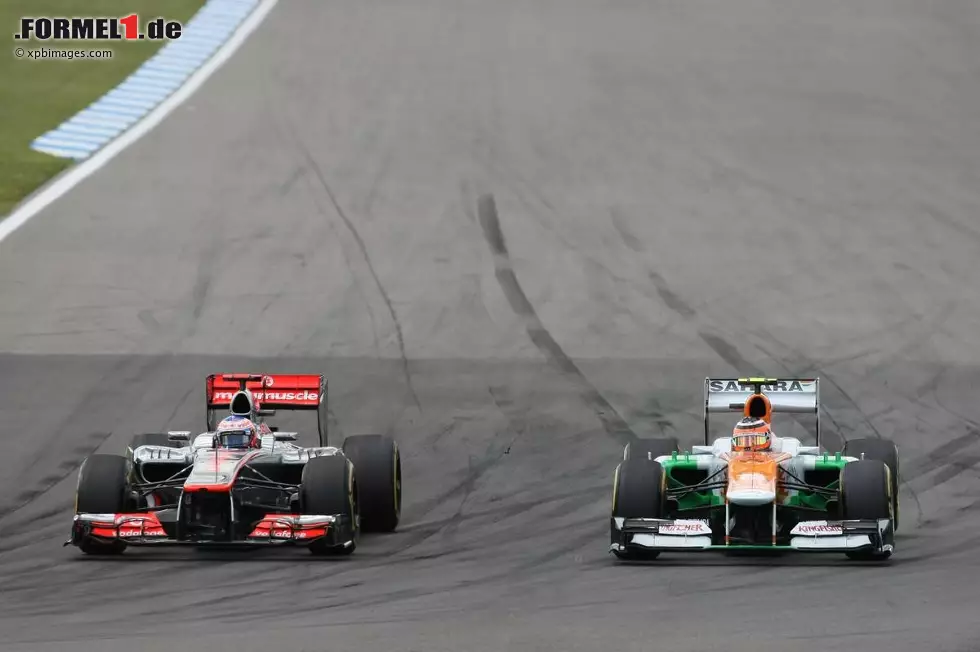 Foto zur News: Jenson Button (McLaren) und Nico Hülkenberg (Force India)