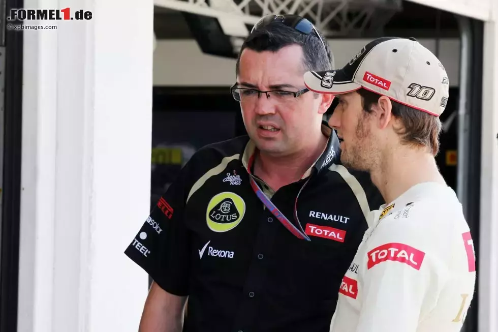 Foto zur News: Eric Boullier (Lotus-Teamchef) und Romain Grosjean (Lotus)