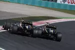 Foto zur News: Kimi Räikkönen (Lotus) und Romain Grosjean (Lotus)