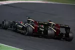 Foto zur News: Kimi Räikkönen (Lotus) und Romain Grosjean (Lotus)