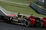 Foto zur News: Kimi Räikkönen (Lotus) und Romain Grosjean (Lotus)