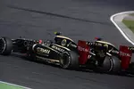 Foto zur News: Kimi Räikkönen (Lotus) und Romain Grosjean (Lotus)