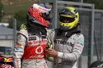 Foto zur News: Jenson Button (McLaren) und Nico Rosberg (Mercedes)