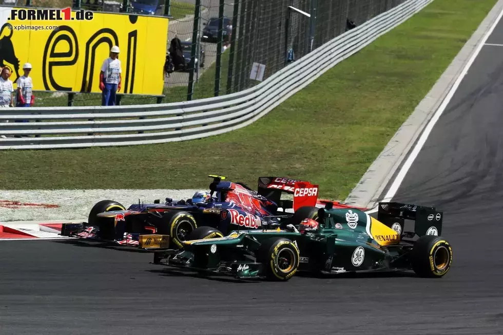 Foto zur News: Jean-Eric Vergne (Toro Rosso) und Heikki Kovalainen (Caterham)