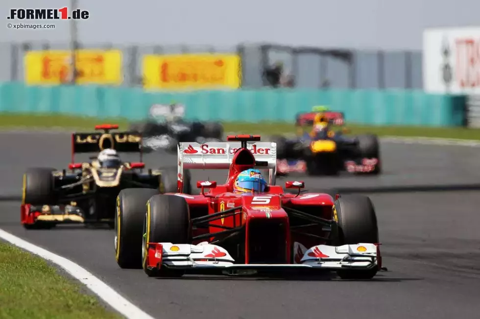 Foto zur News: Fernando Alonso (Ferrari) und Kimi Räikkönen (Lotus)