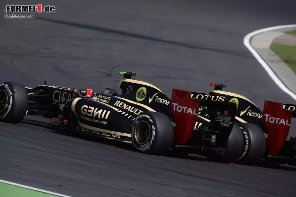 Foto zur News: Kimi Räikkönen (Lotus) und Romain Grosjean (Lotus)