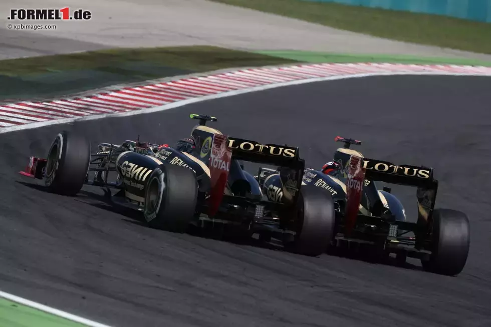 Foto zur News: Kimi Räikkönen (Lotus) und Romain Grosjean (Lotus)