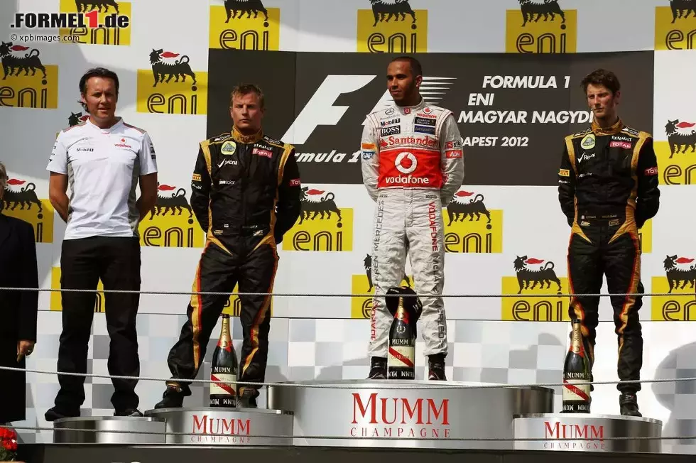 Foto zur News: Lewis Hamilton (McLaren), Romain Grosjean (Lotus) und Kimi Räikkönen (Lotus)