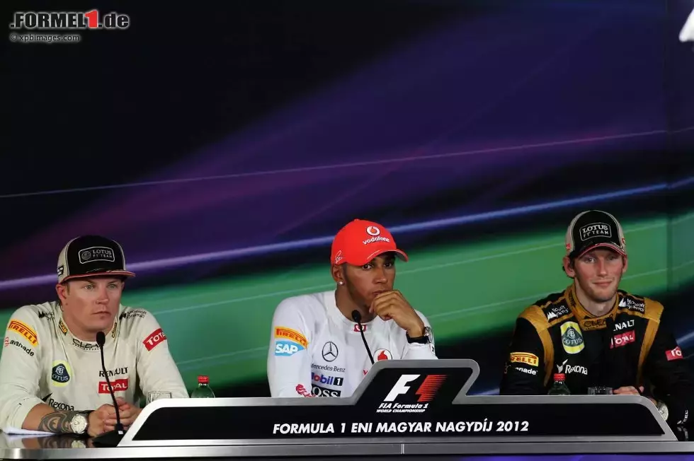 Foto zur News: Lewis Hamilton (McLaren), Romain Grosjean (Lotus) und Kimi Räikkönen (Lotus)