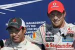 Foto zur News: Kamui Kobayashi (Sauber) und Jenson Button (McLaren)