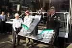 Foto zur News: Gratulation zum 300. Grand Prix: Michael Schumacher (Mercedes), Bernie Ecclestone (Formel-1-Chef) und Norbert Haug (Mercedes-Motorsportchef)