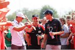 Foto zur News: Michael Schumacher (Mercedes), Timo Glock (Marussia) und Sebastian Vettel (Red Bull)