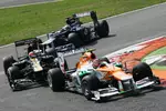 Foto zur News: Nico Hülkenberg (Force India) und Heikki Kovalainen (Caterham)