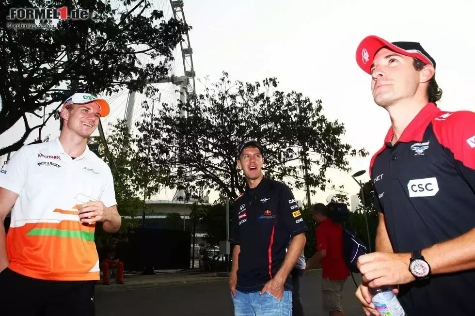 Foto zur News: Deutsche unter sich: Nico Hülkenberg (Force India), Sebastian Vettel (Red Bull) und Timo Glock (Marussia)