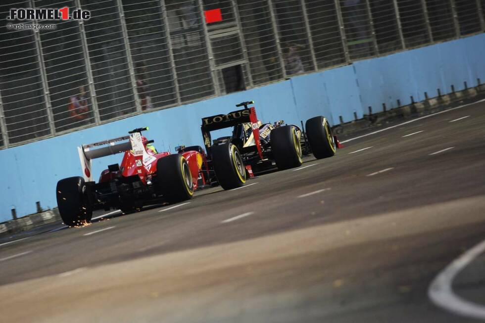 Foto zur News: Felipe Massa (Ferrari) und Romain Grosjean (Lotus)