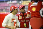 Foto zur News: Felipe Massa und und Marc Gene (Ferrari)