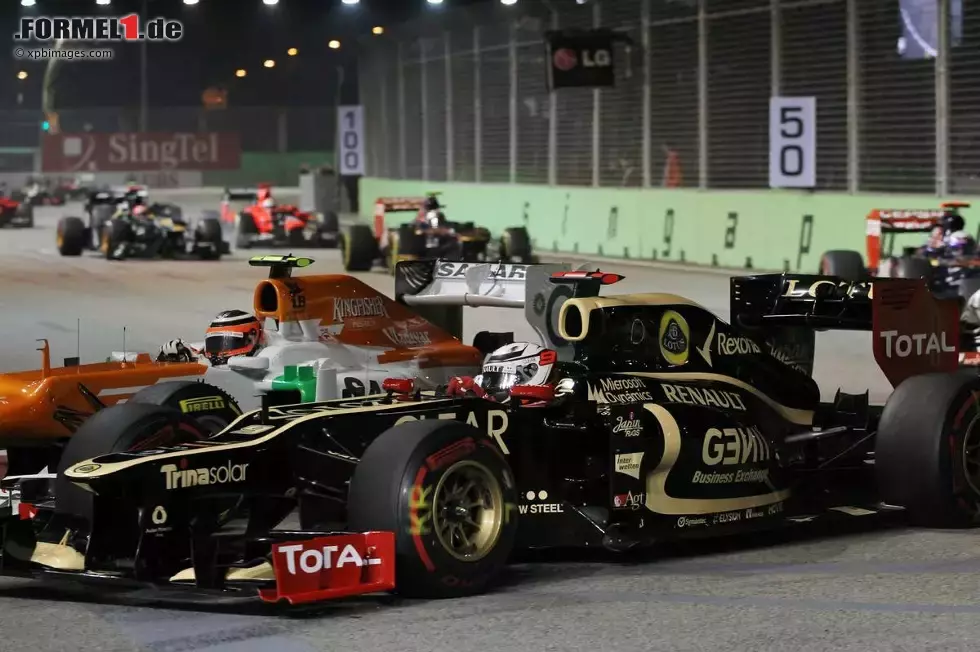 Foto zur News: Nico Hülkenberg (Force India) und Kimi Räikkönen (Lotus)